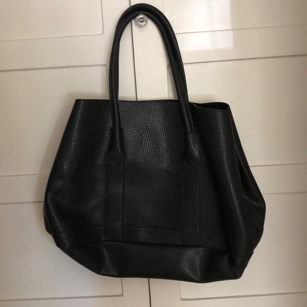 Black hobo style bag. Faux leather